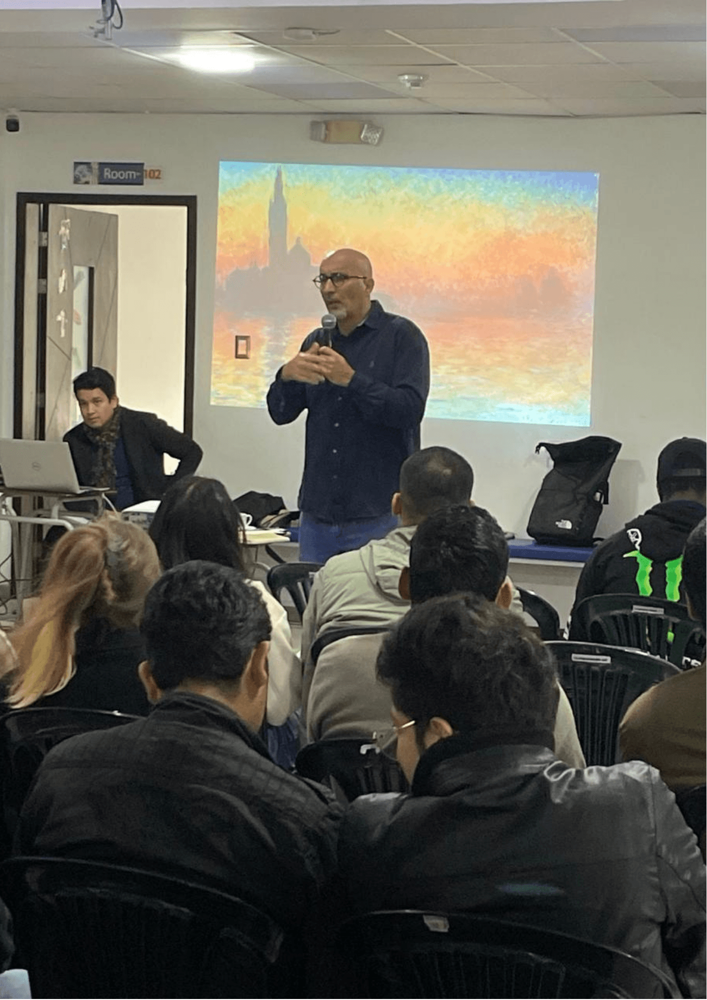 Chaz speaking with a group during a leadership session